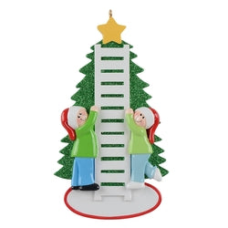 Hanging the Star Personalized Christmas Ornament with 2 people and ladder to add names